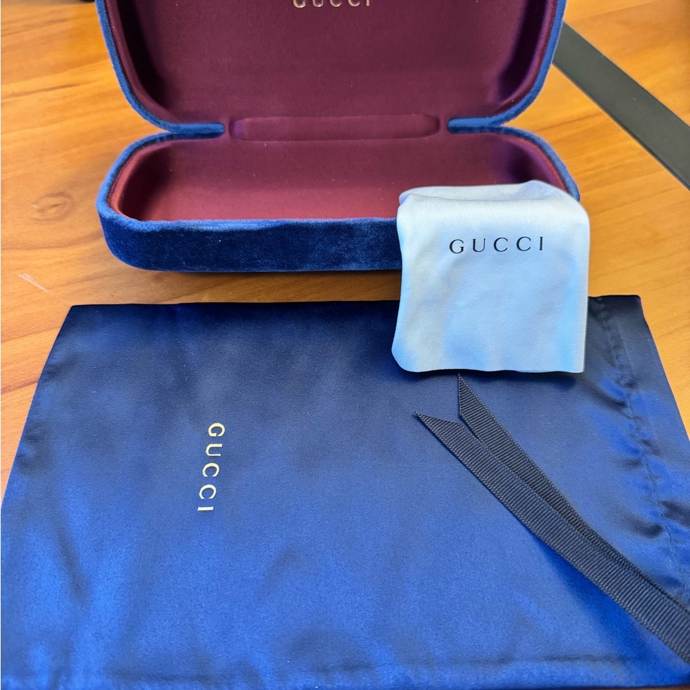 Gucci Blue Velvet sunglasses case with glass wipe and drawstring bag.